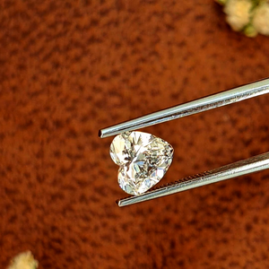 เพชรปลูกในห้องปฏิบัติการ รูปทรงหัวใจ คุณภาพ EX-VG สี D ความสะอาด VVS น้ำหนัก 15.04 กะรัต ผลิตด้วยเทคนิค CVD ได้รับการรับรองจาก IGI สำหรับทำเครื่องประดับ ต่างหู หรือแหวน - Product Image 1