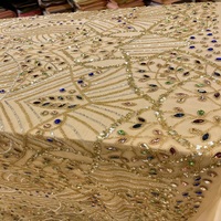 Tissu de dentelle de luxe avec broderie de perles et de paillettes pour robes de mariée, robes de soirée et vêtements de créateurs haut de gamme