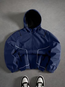 Chaqueta cortavientos al por mayor para mujer, ligera, con cremallera, plegable, con capucha, resistente al viento y a la lluvia, para deportes al aire libre. - Product Image 1