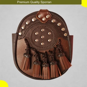 Sporran écossais en cuir marron premium clouté avec motif celtique en relief et cinq pompons décoratifs - Product Image 1