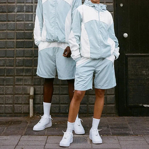 Ensemble de survêtement en nylon pour homme avec logo brodé du fabricant, pantalon de jogging color block et coupe-vent personnalisé - Product Image 2