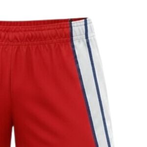 Shorts de netball unisexe rouge et blanc sublimés en polyester léger, uniforme sportif athlétique avec panneau latéral à rayures, tenue de performance - Product Image 3