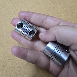 Acoplamiento de Transmisión de Acero Inoxidable de Alta Calidad, Venta Directa de Fábrica OEM, Eje Flexible de 10 mm de Diámetro Interior, 1000 RPM, Modelo MM1, Electroerosión por Hilo - Product Image 1