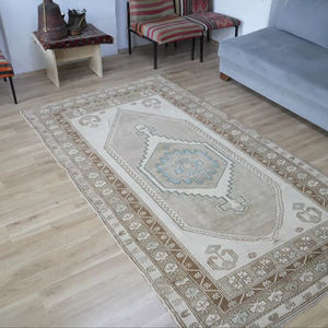 Vibrante Alfombra Bereber Marroquí Tejida a Mano con Patrones Geométricos, Camellos, Casas y Estrellas - Product Image 1