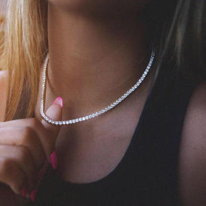 Collier tennis de luxe pour femme en argent 925 plaqué rhodium avec moissanite taille brillant rond sertie en canal sur chaîne serpent, pour le quotidien - Product Image 1