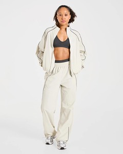 Ensemble coupe-vent imperméable professionnel pour femme – Veste à capuche à manches longues coupe ample et pantalon de jogging – Tenue décontractée pour activités sportives en extérieur - Product Image 1