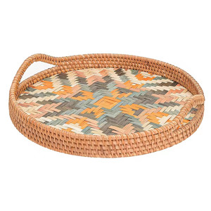 Round serving tray, a harmonious combination of rattan and natural bamboo. Features a handle. - Product Image 4