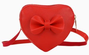 Mini bolso cruzado, adecuado para niñas y niños, monedero, ligero y portátil, diseño con solapa, decoración con lazo, forma de corazón - Product Image 2