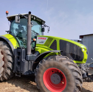 รถแทรกเตอร์ Claas Axion 950 4x4 เครื่องยนต์ดีเซลกำลังสูงสำหรับการเกษตร รถแทรกเตอร์แบบมีห้องโดยสาร เครื่องจักรกลหนักสำหรับงานภาคเกษตร ราคาขายส่ง - Product Image 1