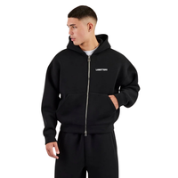 Ensemble de survêtement deux pièces pour homme avec sweat à capuche zippé, poches latérales, pantalon à taille élastique, jambe large et ourlet ouvert, coupe décontractée