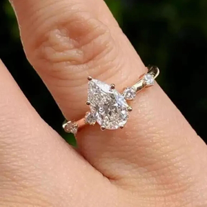 Pear Cut Moissanite Engagement Ring, Teardrop Diamond Ring with Accent Stones, Elegant Gold Minimalist Ring for Women - Product Image 1