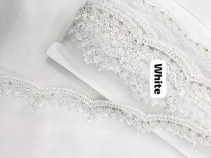 Tissu en dentelle perlée écologique de luxe avec broderie française et motif géométrique pour robes de mariée et tenues de soirée - Product Image 3