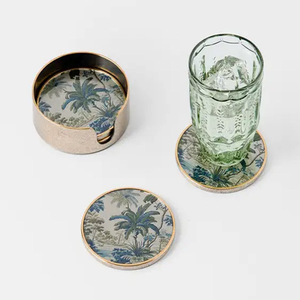 ชุดจานรองแก้วทองเหลืองลายต้นไม้สไตล์วินเทจ 4 ชิ้น พร้อมที่วาง - Product Image 1