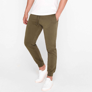 Pantalon de survêtement en coton pour homme, style streetwear, coupe évasée, jambe droite ample et cordon de serrage, design décontracté à jambe large. - Product Image 1