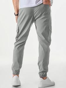 Pantalones cargo de corte holgado y a la moda, hechos con tela de algodón de primera calidad, con bolsillos laterales con solapa, trabillas para cinturón y un ajuste cómodo. - Product Image 3