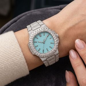 Luxury <b>diamond</b> wristwatch with turquoise blue dial textured lines silver markers date window ornate bracelet lavish sparkling - Product Image 6