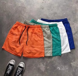 Shorts de plage décontractés pour hommes, écologiques, respirants, amples, à séchage rapide, couleur unie, longueur genou, taille mi-haute, en maille, haute qualité - Product Image 4