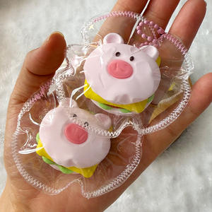 CHENXI Mini Llavero de Hamburguesa de Cerdo, Juguetes Blandos Antiestrés Fidget Taba para Niños - Product Image 1