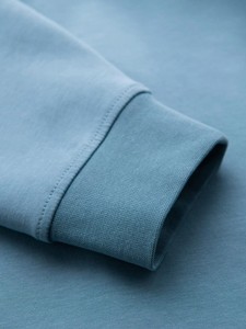 เสื้อฮู้ดสีฟ้าอ่อนแบบยูนิเซ็กซ์ มีกระเป๋าหน้า ทรงหลวม สวมใส่สบาย เหมาะสำหรับฤดูหนาว ผลิตจากผ้าฝ้ายฟลีซ 100% ป้องกันการเป็นขุย - Product Image 6