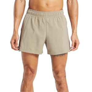 กางเกงขาสั้นลำลองสำหรับผู้ชาย - ผ้าเนื้อบางเบาและระบายอากาศได้ดี พร้อมเทคโนโลยีแห้งเร็วที่เป็นมิตรต่อสิ่งแวดล้อม สำหรับการวิ่งและการออกกำลังกายในยิม - Product Image 1