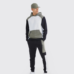 Ensemble de survêtement sportif 2 pièces tendance pour l'hiver, coupe ajustée, sweat à capuche épais et pantalon de jogging assorti, 100% polyester, pour homme - Product Image 1