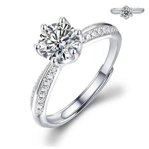 Anillo moderno de moissanita con corte esmeralda, engaste en tono plateado con borde reducido, joyería fina llamativa para mujer, ideal para regalos de boda. - Product Image 1