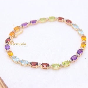 กำไลข้อมือเทนนิสทรงรีประดับเพชรและพลอยหลากสีทองคำแท้ 14K สำหรับผู้หญิง เหมาะสำหรับงานปาร์ตี้และงานแต่งงาน - Product Image 1