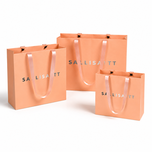 Bolsas de Compras de Papel de Lujo Color Durazno con Logotipo Personalizado y Asas de Listón, Bolsas de Regalo al por Mayor para Boutique, Cosméticos y Comercio Minorista - Product Image 1