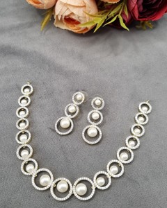 Circular Link Designer Gold Plated <b>Necklace</b> <b>Set</b> <b>Pearl</b> Center Motif And Matching Triple Circle Earrings For Party Wear Collection - Product Image 2