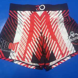 Shorts de Muay Thai confortables, fabriqués en tissu léger, avec taille élastique et coupe décontractée, parfaits pour la salle de sport et les séances d'entraînement. - Product Image 1