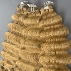 Precio al por mayor Paquetes Rubio ondulado Cabello crudo vietnamita Virgen SDD Tipo de trama de la piel Extensiones de cabello humano tejido - Product Image 1