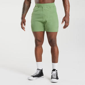 กางเกงขาสั้นออกกำลังกายผู้ชายแบบปรับแต่งได้สำหรับฤดูร้อน กางเกงขาสั้นลำลองผ้าฝ้ายสำหรับเล่นกีฬาและวิ่ง มีกระเป๋า กางเกงขาสั้นผ้าฟลีซสีพื้นสำหรับผู้ชาย - Product Image 1