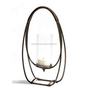 Luxury Modern Handmade Black Color Metal Iron Hurricane Candleholder Unique Shape Shinny Polish Decorative Metal Candle Holder - Product Image 1
