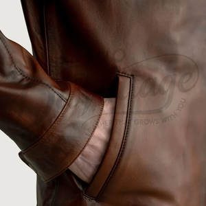 เสื้อแจ็คเก็ตหนังแท้สีน้ำตาลแทนสำหรับผู้ชาย รุ่นพรีเมียม สไตล์คลาสสิคคาเฟ่เรเซอร์ คอตั้ง ทรงเข้ารูป แฟชั่นลำลอง - Product Image 2
