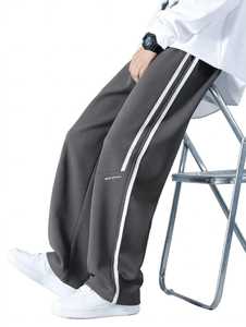 Pantalones Deportivos Anchos Gris Oscuro para Hombre con Franja Lateral Blanca, Estilo Urbano, Casual, Corte Recto - Product Image 5