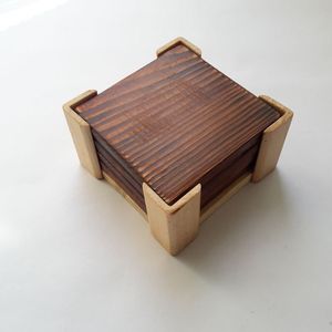 Handmade wooden <b>coaster</b> with artistic finish perfect for gift hampers and festive celebration packages - Product Image 1