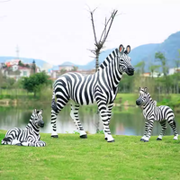 Sculpture d'animal en résine zèbre en vente chaude, statue de cheval zèbre grandeur nature pour la décoration de la pelouse du jardin