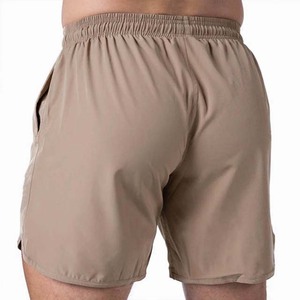 Shorts pour hommes à couleur unie, séchage rapide, avec cordon de serrage, taille mi-haute, décontractés, pour la gym et l'entraînement, en tissu polyester, avec poches - Product Image 6