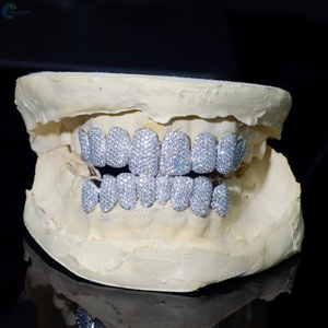 Juego Completo Premium de Grillz de Moissanita y Plata 925, con Incrustaciones de Piedras, para Dientes Superiores e Inferiores, Joyería Dental Personalizada Estilo Hip Hop - Product Image 1
