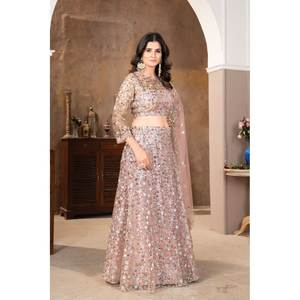 Hermosos vestidos de noche Ropa de fiesta elegante Lehenga Choli con impresionante trabajo de secuencia - Product Image 5