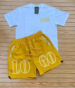 ชุดเสื้อยืดและกางเกงขาสั้นผ้าฝ้ายระบายอากาศสำหรับผู้ชายใส่สบายในฤดูร้อน แขนสั้น สีพื้น ชุดสองชิ้น - Product Image 1