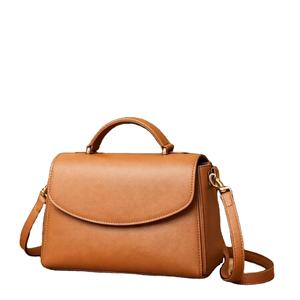 Este artículo es un bolso de cuero marrón para mujer, disponible en tiendas de artículos de bolsos. - Product Image 1