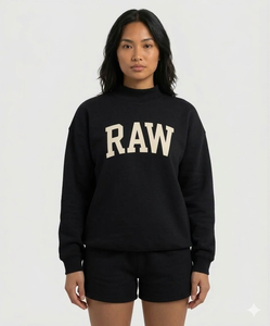 Ensemble haut à col montant et short pour femme, reflétant un concept vestimentaire moderne avec une tenue deux pièces distincte - Product Image 1