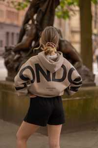 Sweat à capuche unisexe surdimensionné avec grand texte, personnalisable avec le nom du club/équipe, impression audacieuse des logos du club/équipe pour les demandes en gros - Product Image 1
