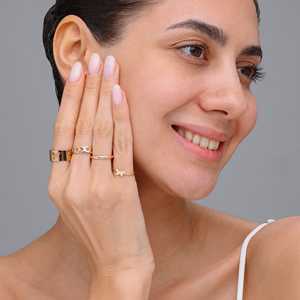 ชุดเครื่องประดับแฟชั่นปรับขนาดได้สี่วงแหวนสง่างาม - Product Image 1