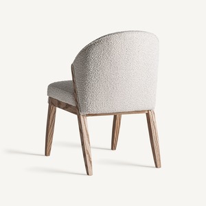 Silla de Comedor Nórdica Tapizada con Tela Texturizada y Estructura de Madera Sólida para Interiores Contemporáneos - Product Image 4