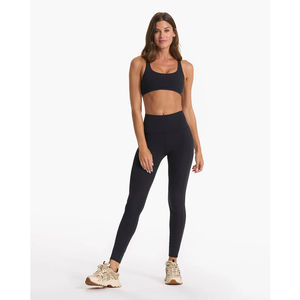 Ensemble de sport 2 pièces confortable et décontracté pour femme : soutien-gorge de sport et leggings taille haute pour la gym, motif uni, écologique et respirant - Product Image 1