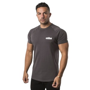 Camiseta de gimnasio para hombre, de secado rápido, transpirable, 100% poliéster, logotipo personalizado, patrón sólido OEM, manga corta, estilo de punto - Product Image 1