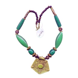 Bohemian Silver Tassel Pendant <b>Necklace</b>. Handcrafted with intricate detailing, this <b>statement</b> piece beautifully engraved - Product Image 1