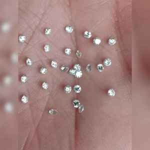 Diamante Suelto de Corte Brillante Natural, Modelo RD-N4 de RAMDUT IMPEX, Origen Gujarat, Perforado con Láser, Color G, Corte Excelente, Directo de Fábrica - Product Image 1